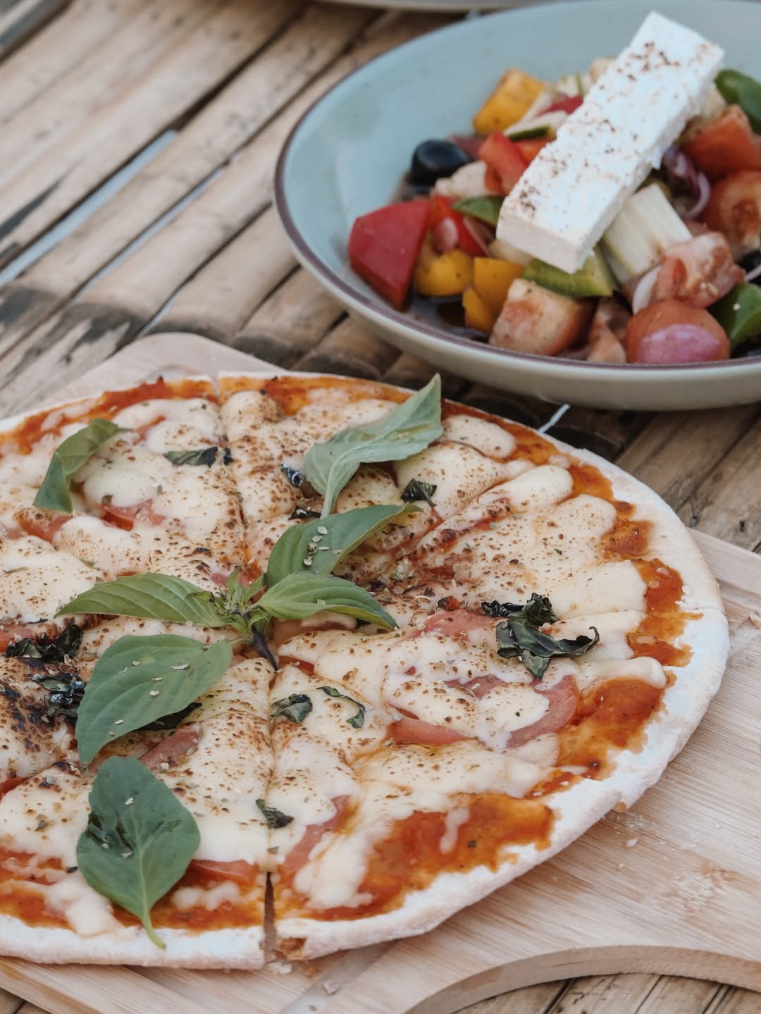 Pizza margherita and Greek salad at the Jump Shack kitchen